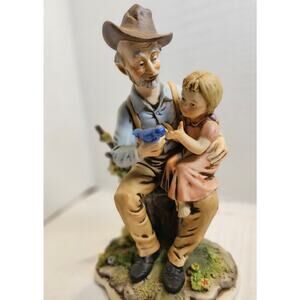 Elderly Man Sharing Bluebird moment with Girl Porcelain Figure Made in Mexico